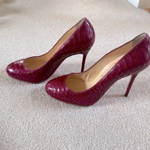 Christian Louboutin, pink python style pumps